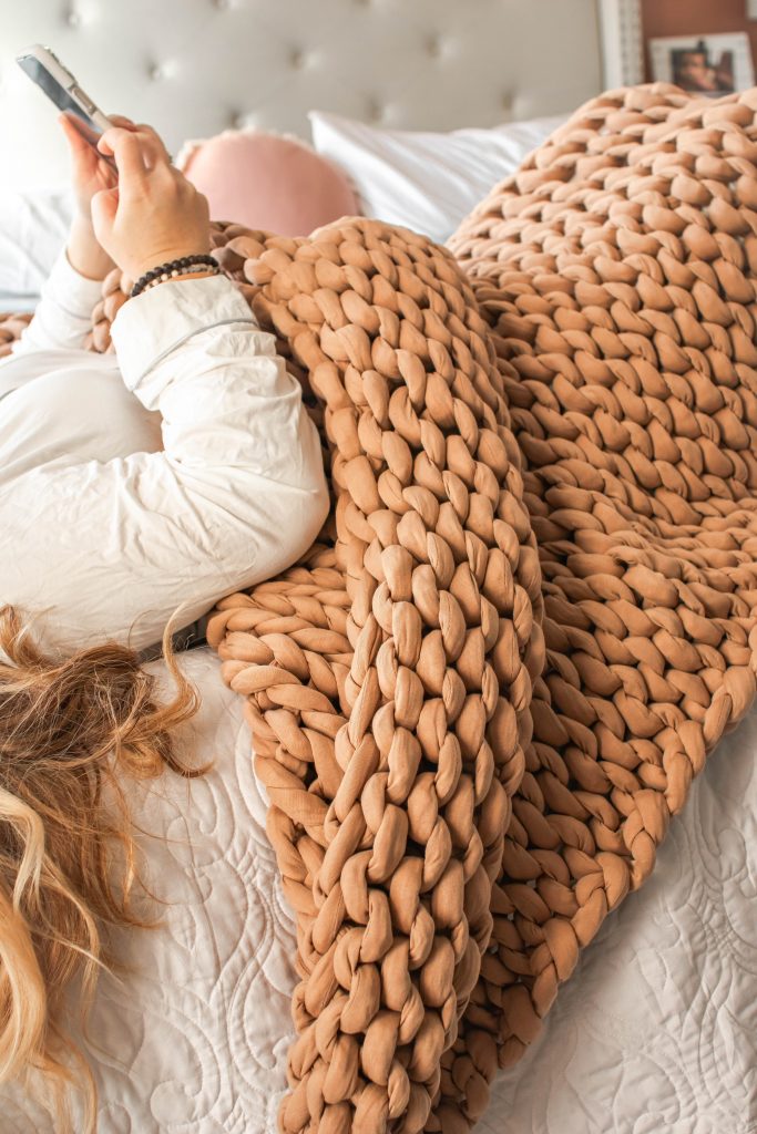 Nicki Odom with Bearaby Tree Napper Cooling Weighted Blanket