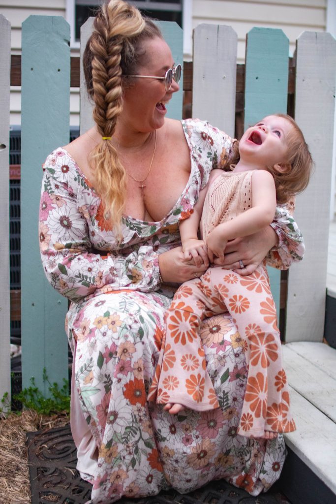 Nicki odom with daughter in retro spring style fashion laughing