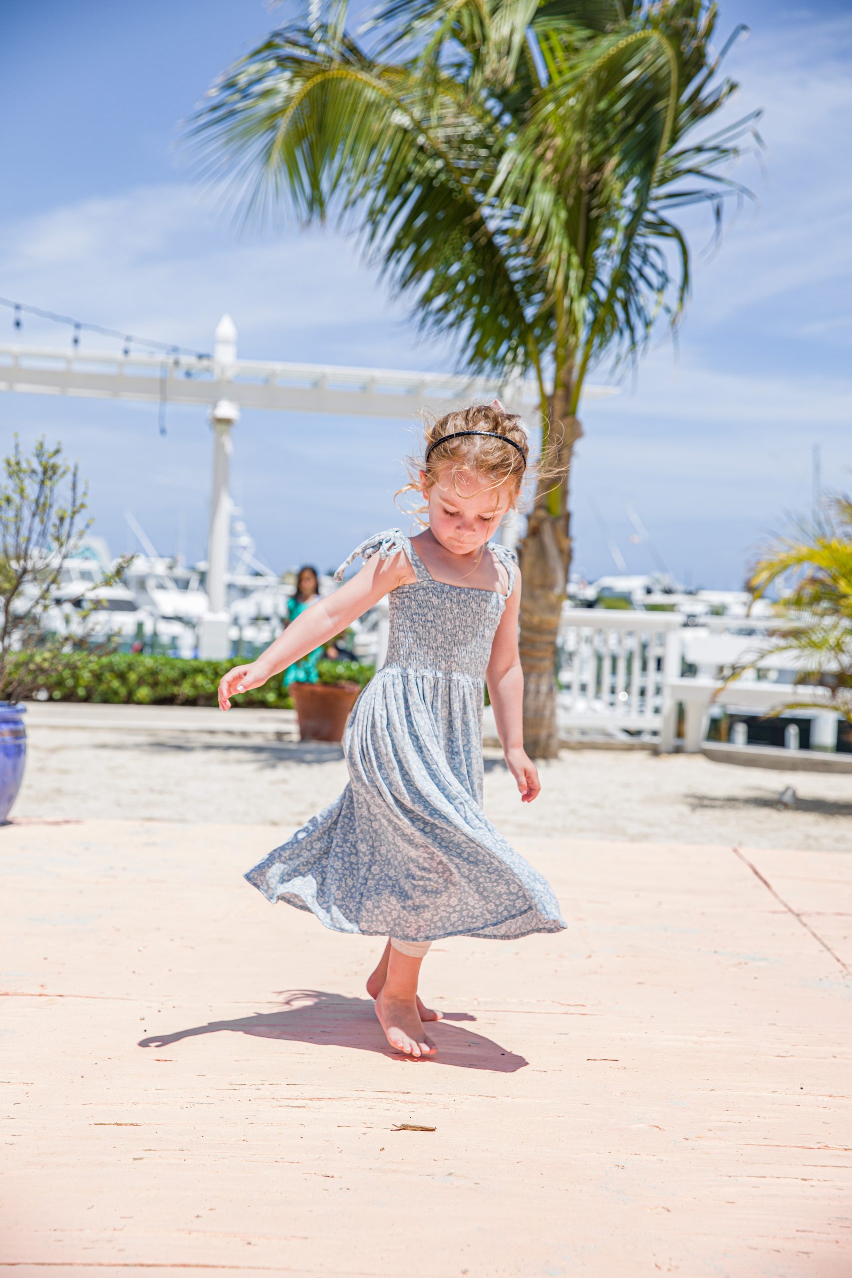 Toddler girl in maxi dress on Easter in Hope Town Bahamas
