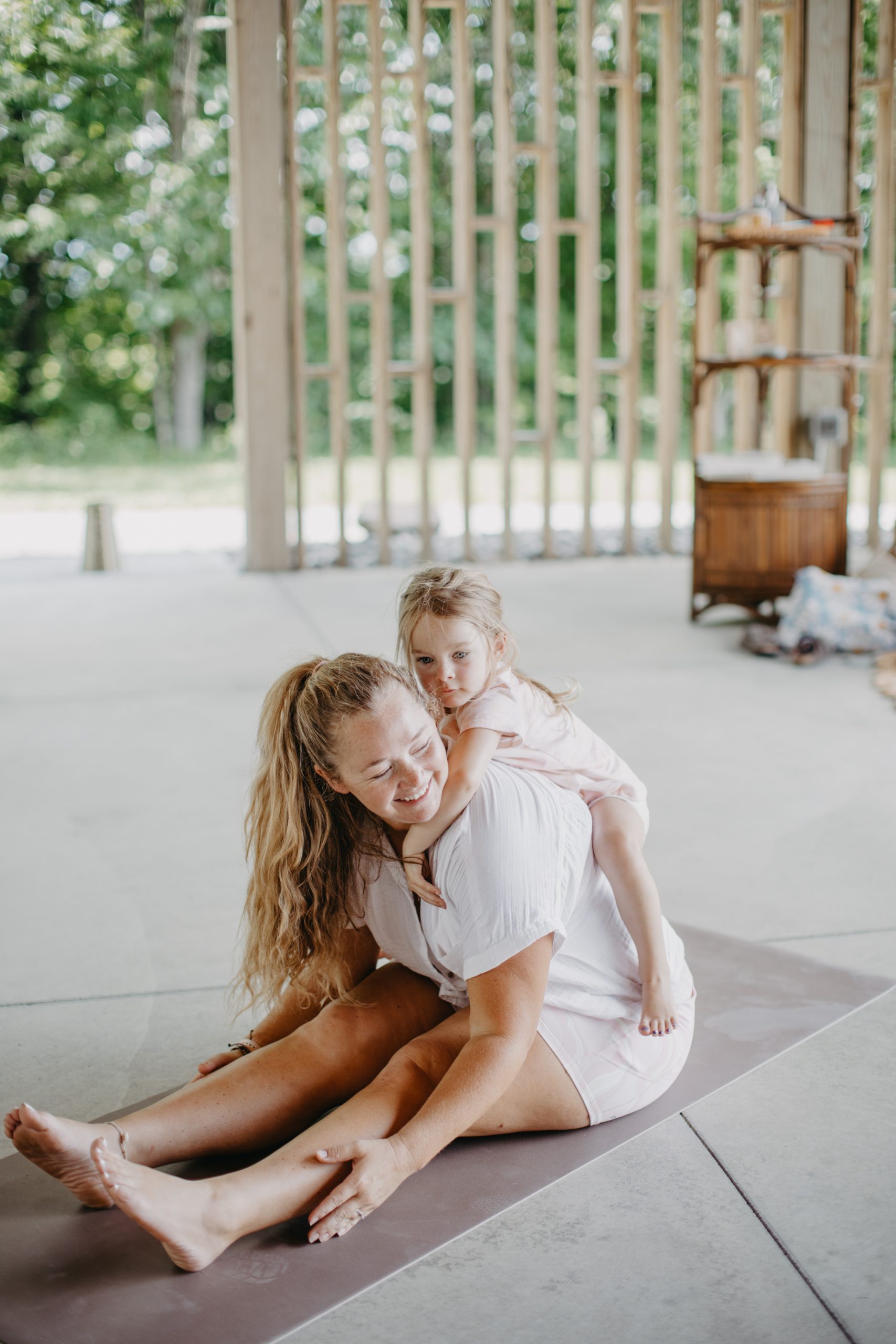 Wanderlust Family Retreats Nicki Odom and daughters in mommy and me yoga class
