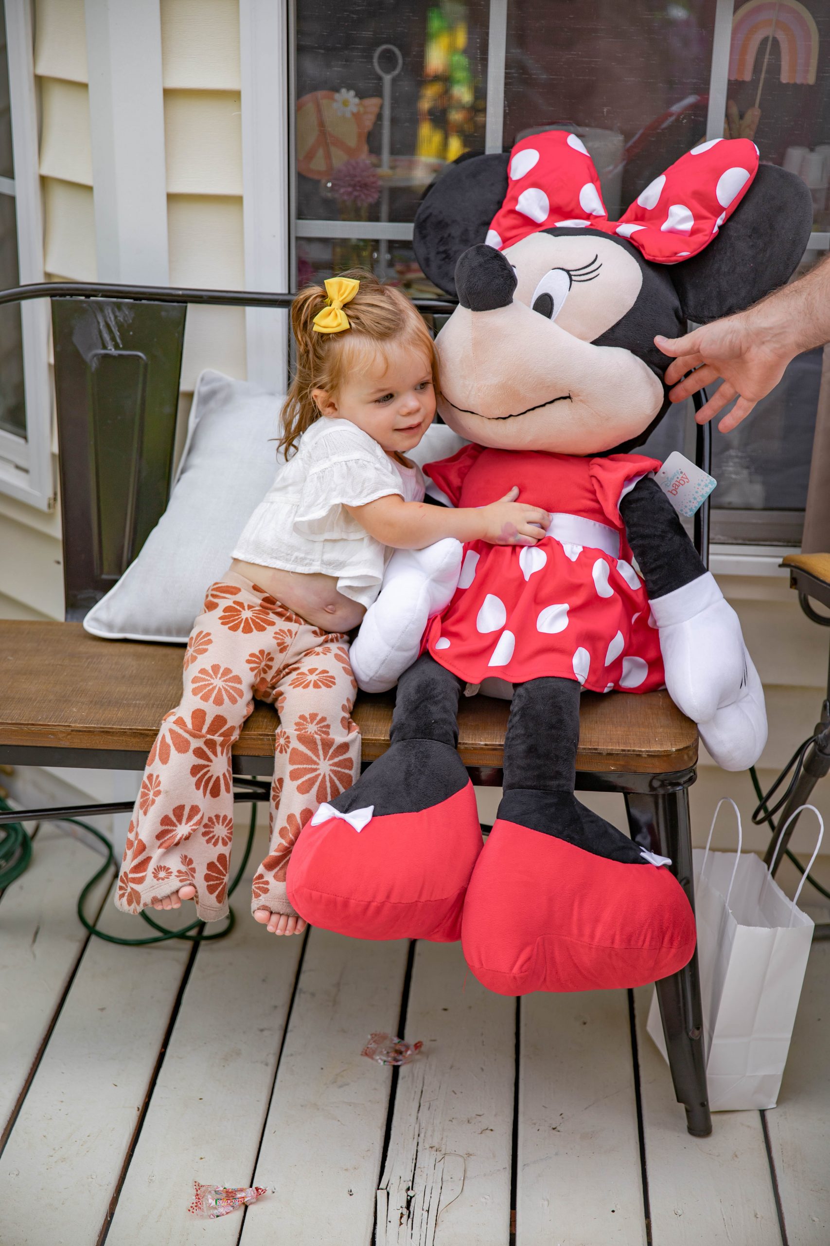 Nicki Odom daughter with new birthday present at Second birthday