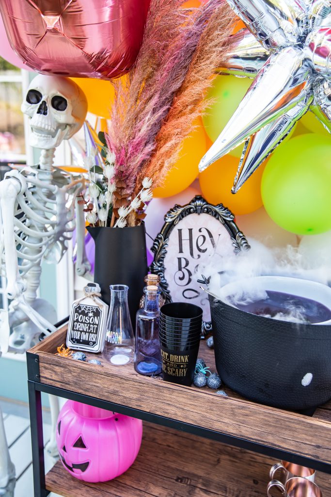 Halloween Ghoul Gang Girl Party with Skeleton at the bar cart