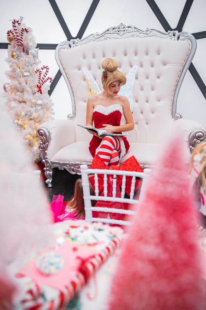 Nicki Odom with daughters make magic wands at Candy Cane Christmas tea party with Tinkerbell