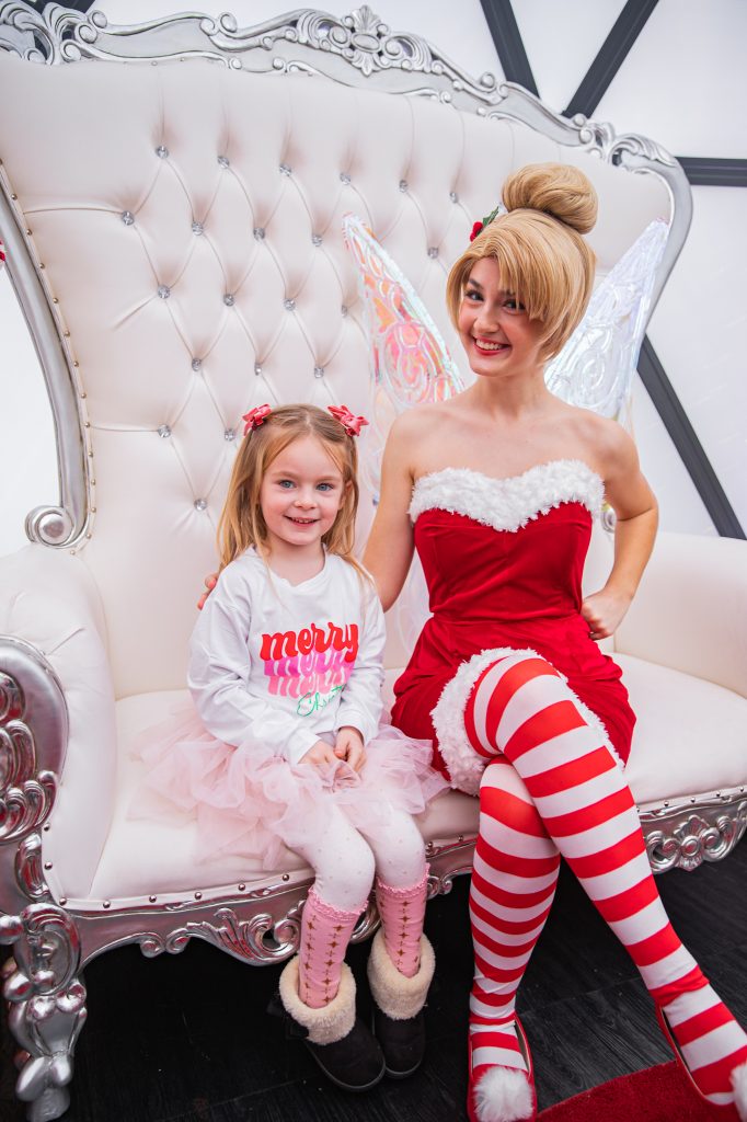 Nicki Odom with daughters make magic wands at Candy Cane Christmas tea party with Tinkerbell