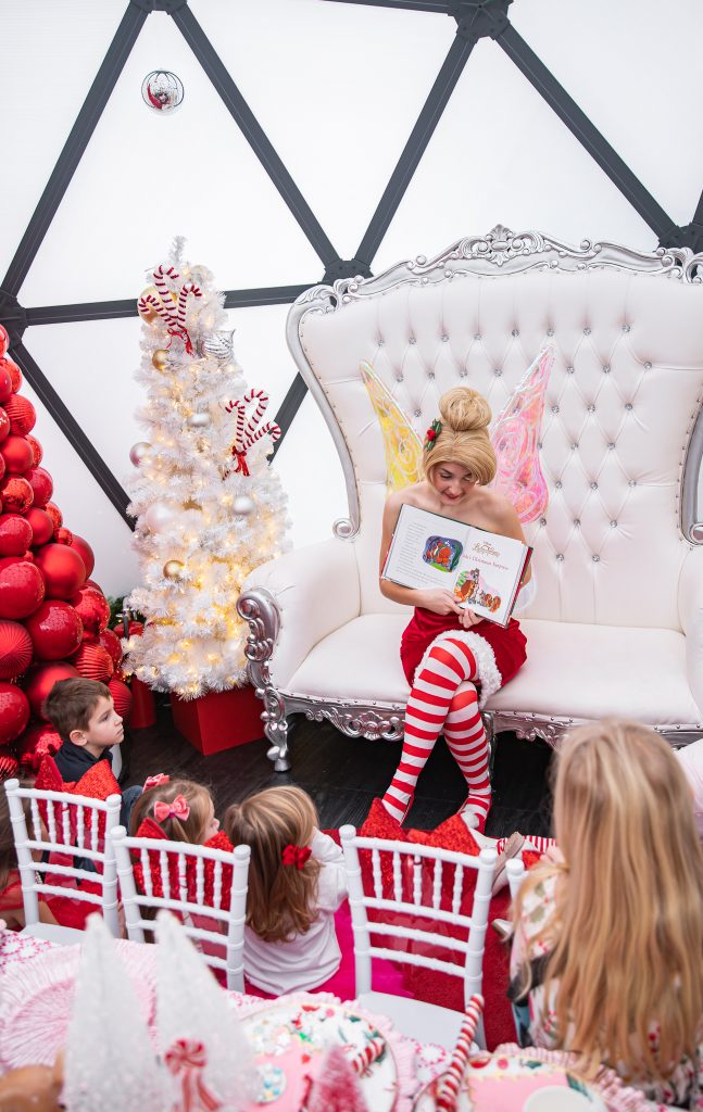 Nicki Odom with daughters make magic wands at Candy Cane Christmas tea party with Tinkerbell