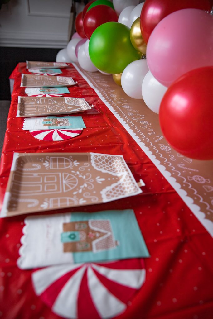 Christmas gingerbread house making party dining table decorations