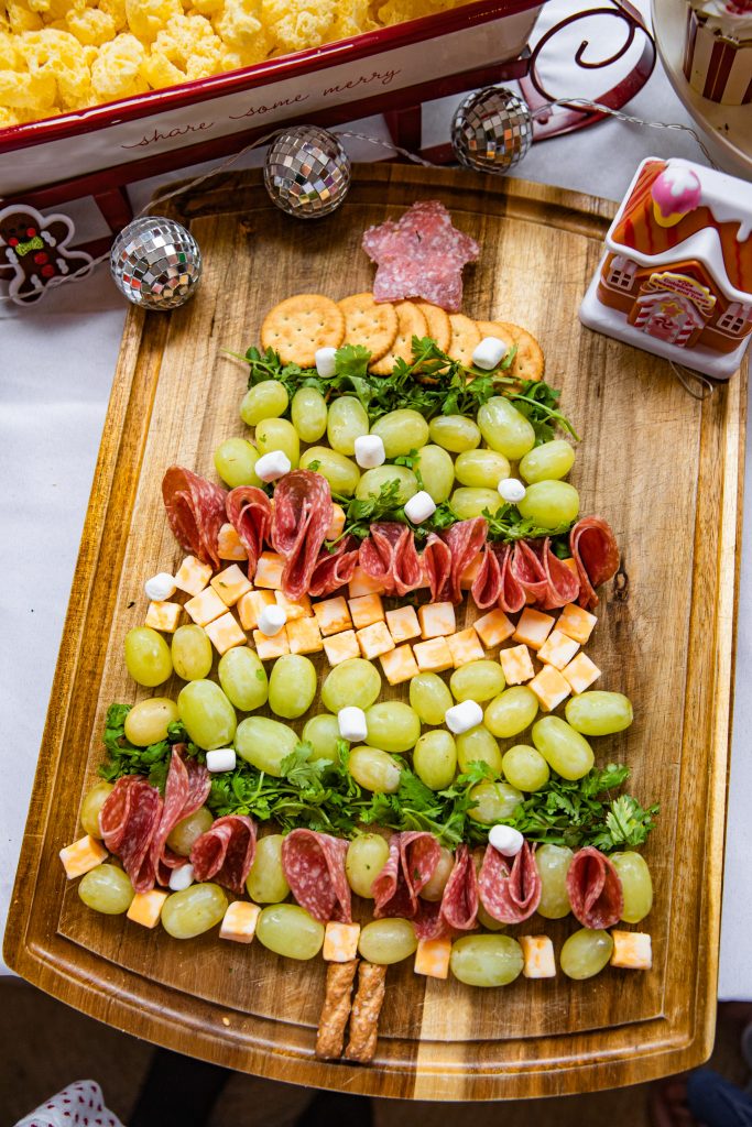 Christmas Tree charcuterie board at Gingerbread house making Christmas party