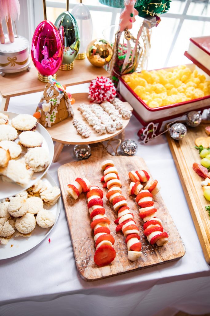 Candy cane fruit platter for Christmas gingerbread house party
