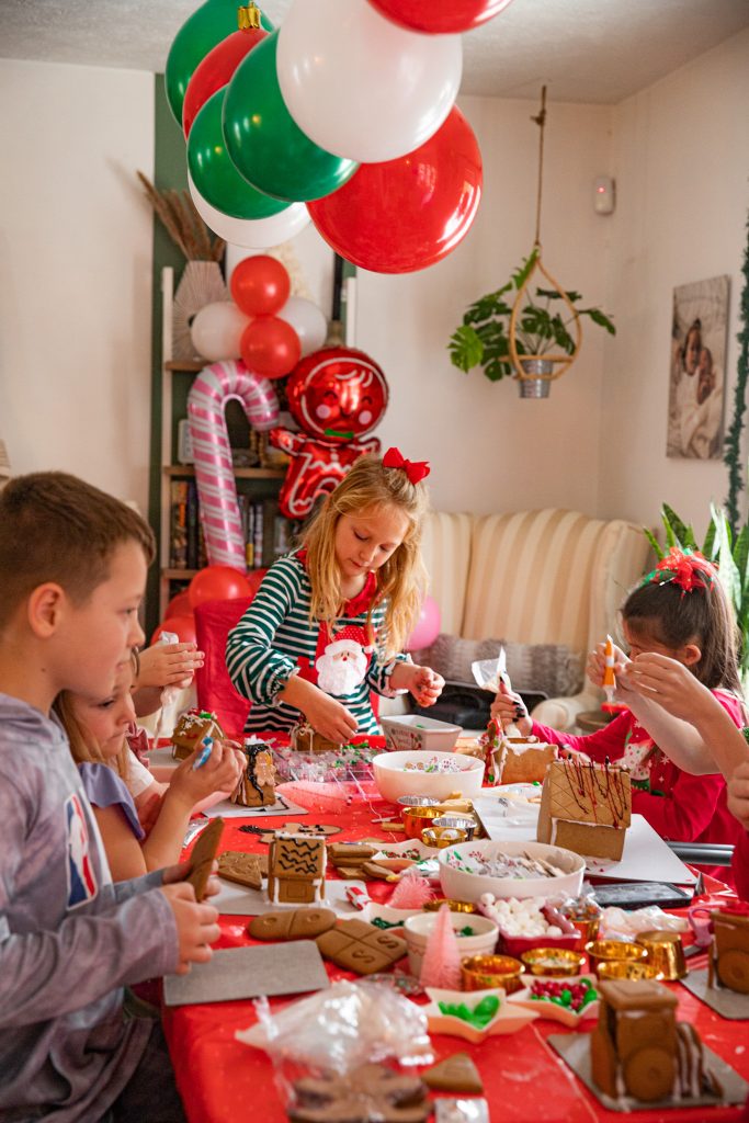 kids at Christmas Gingerbread House making party
