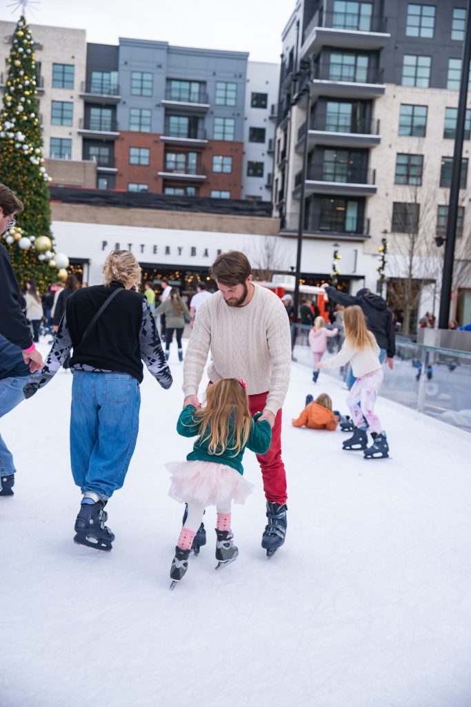 Christmas fun at Fenton in Cary, NC. Nicki Odom and family ice skating