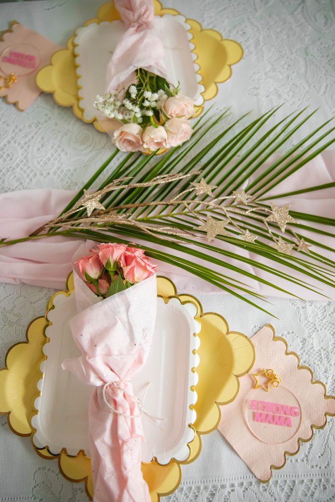 Party table setting with palm fronds by Nicki Odom