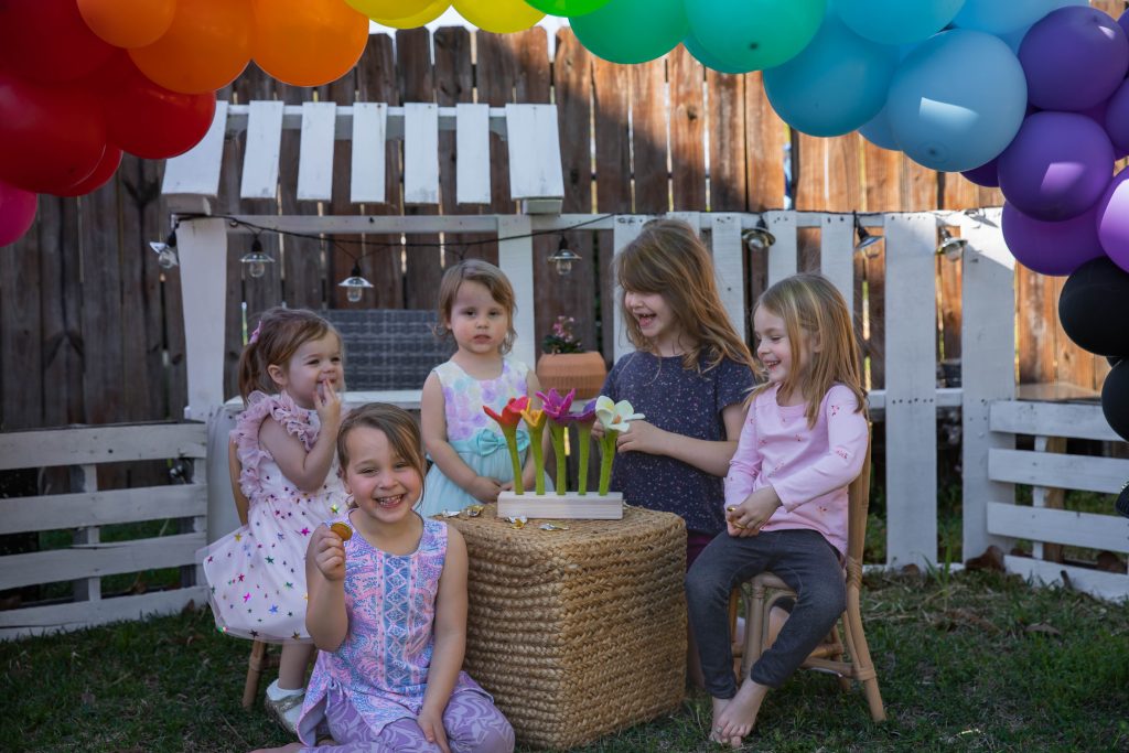 Kids Market St. Patrick's Day Pot Of Gold Toddler girls tea party under rainbow balloon arch