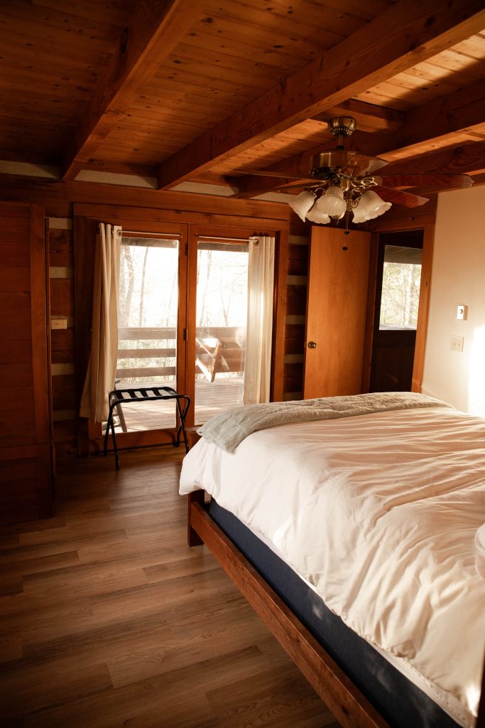Master bedroom At Mountain Getaway at 36 North Cabins in Purlear NC