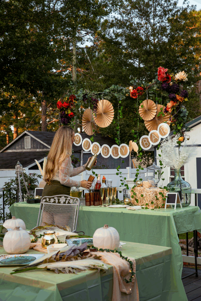 Nicki Odom setting up dinner party for crafts and cocktails fall crafting party