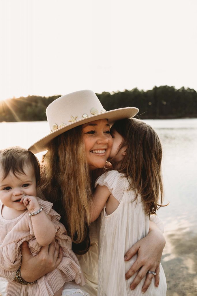 Nicki Odom and daughters hugging for Mother's Day Photoshoot