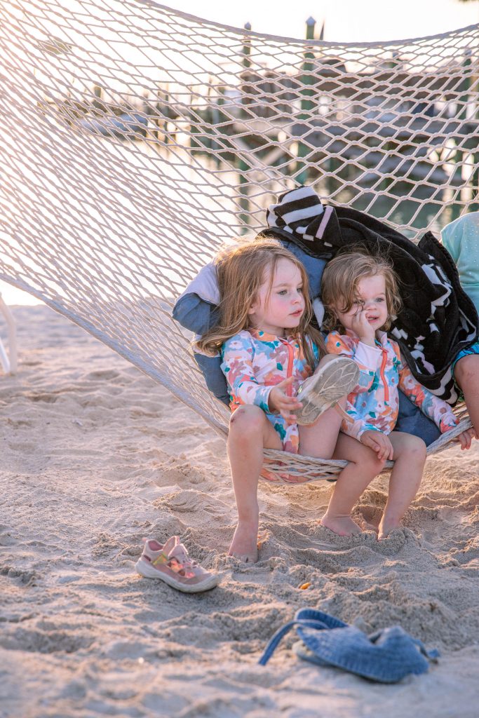 Family Bahamas Vacation In Hope Town Day 1 & 2 - Two Girls in Hammock at Grabbers Beach Bar