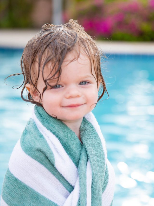 Nicki Odom's daughter at the pool in Hope Town Inn & Marina Bahamas
