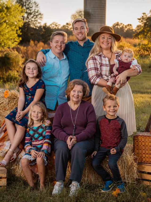 Nicki Odom with her grandmother and family taking fall family photos