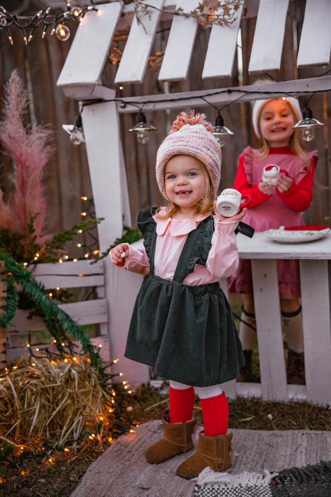 Kids Christmas Tree Farm with Nicki Odom's daughters in Christmas outfits