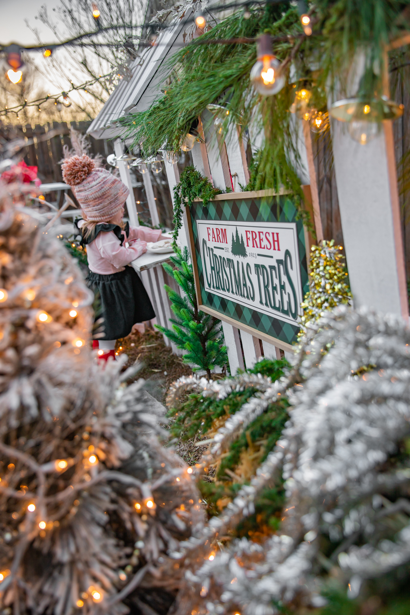 Kids Christmas Tree Farm with Nicki Odom's daughters in Christmas outfits