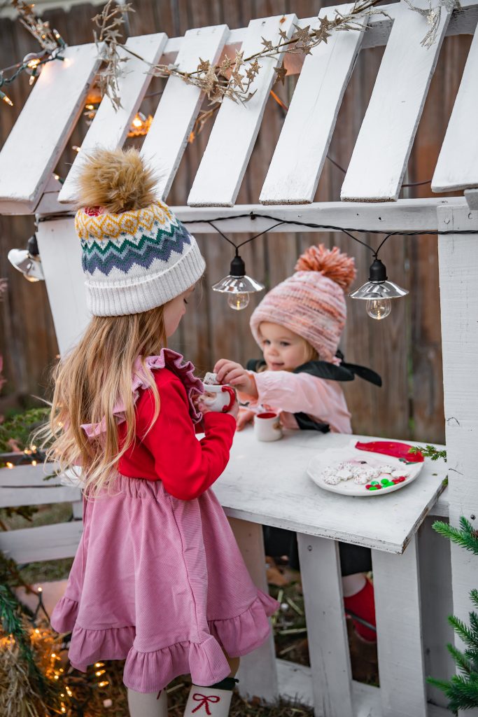 Kids Christmas Tree Farm Photoshoot - Nicki Odom's daughter drinking hot chocolate