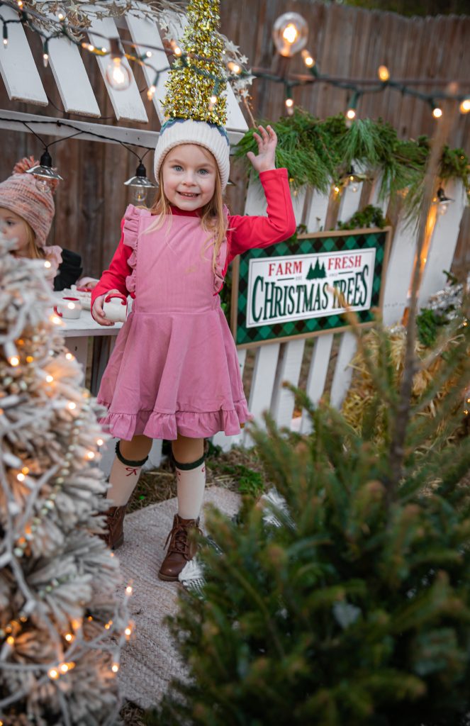 Kids Christmas Tree Farm Photoshoot - Nicki Odom's daughter drinking hot chocolate