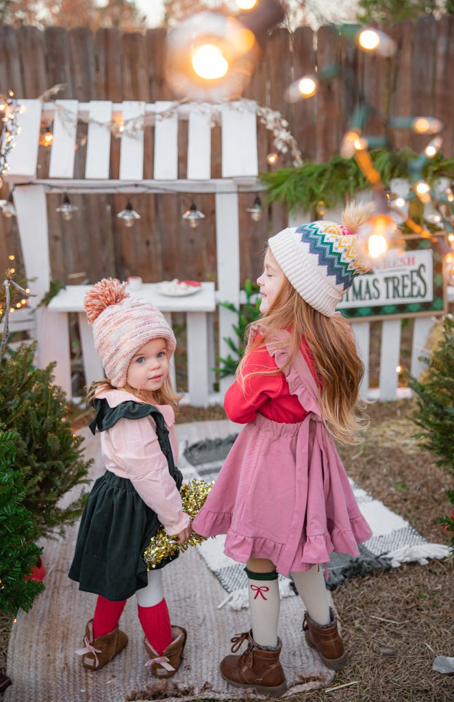 Kids Christmas Tree Farm Photoshoot - Nicki Odom's daughter drinking hot chocolate