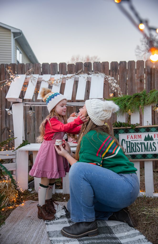 Kids Christmas Tree Farm Photoshoot - Nicki Odom's daughter drinking hot chocolate