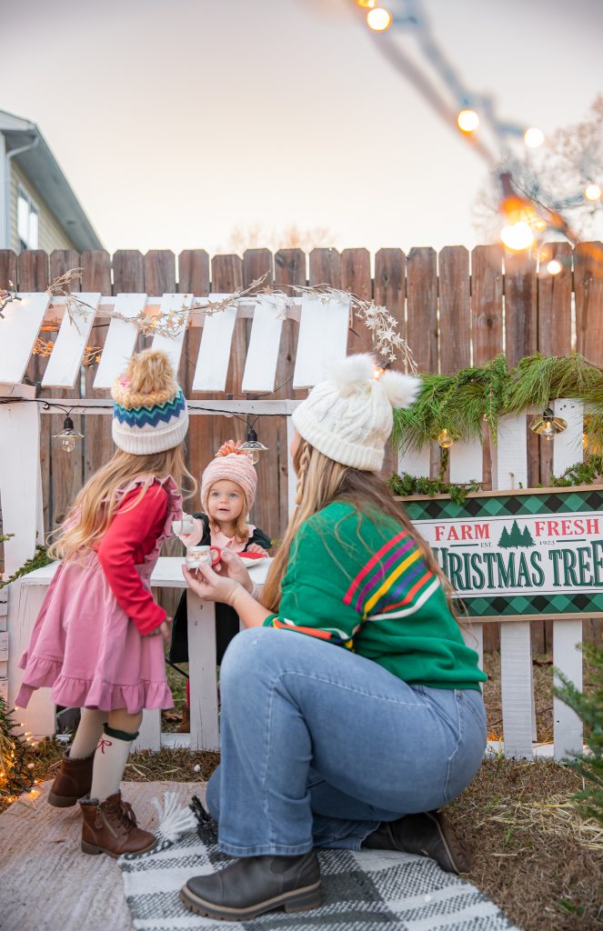 Kids Christmas Tree Farm Photoshoot - Nicki Odom's daughter drinking hot chocolate