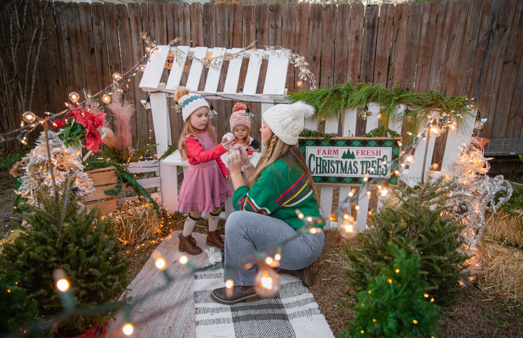 Kids Christmas Tree Farm Photoshoot - Nicki Odom's daughter drinking hot chocolate