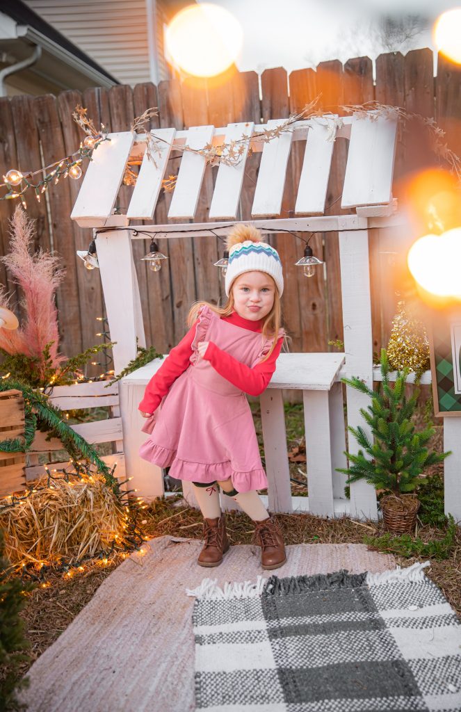 Kids Christmas Tree Farm Photoshoot - Nicki Odom's daughter drinking hot chocolate