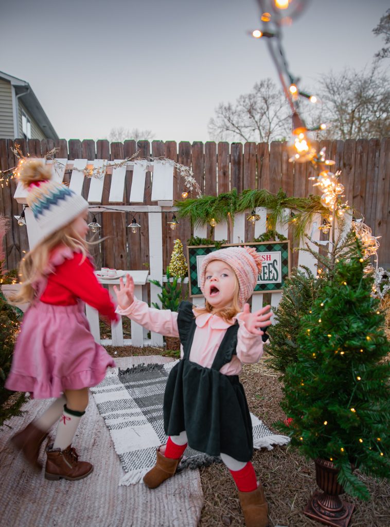 Kids Christmas Tree Farm Photoshoot - Nicki Odom's daughter drinking hot chocolate