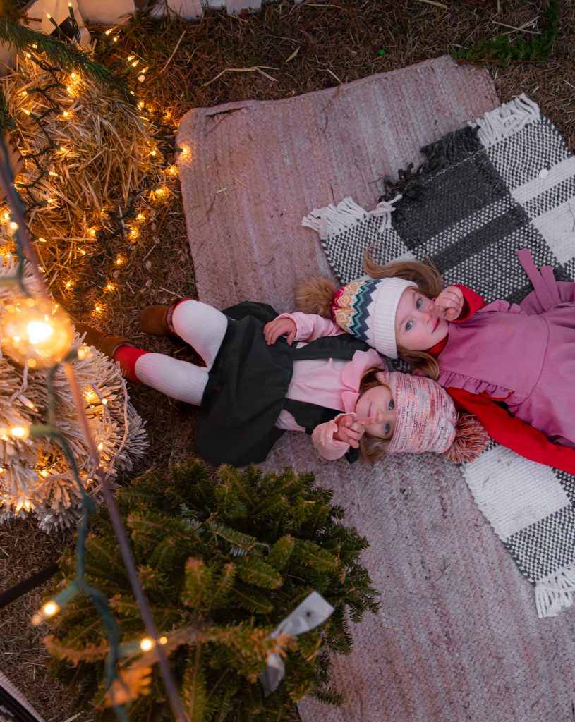 Kids Christmas Tree Farm Photoshoot - Nicki Odom's daughter's looking at the stars
