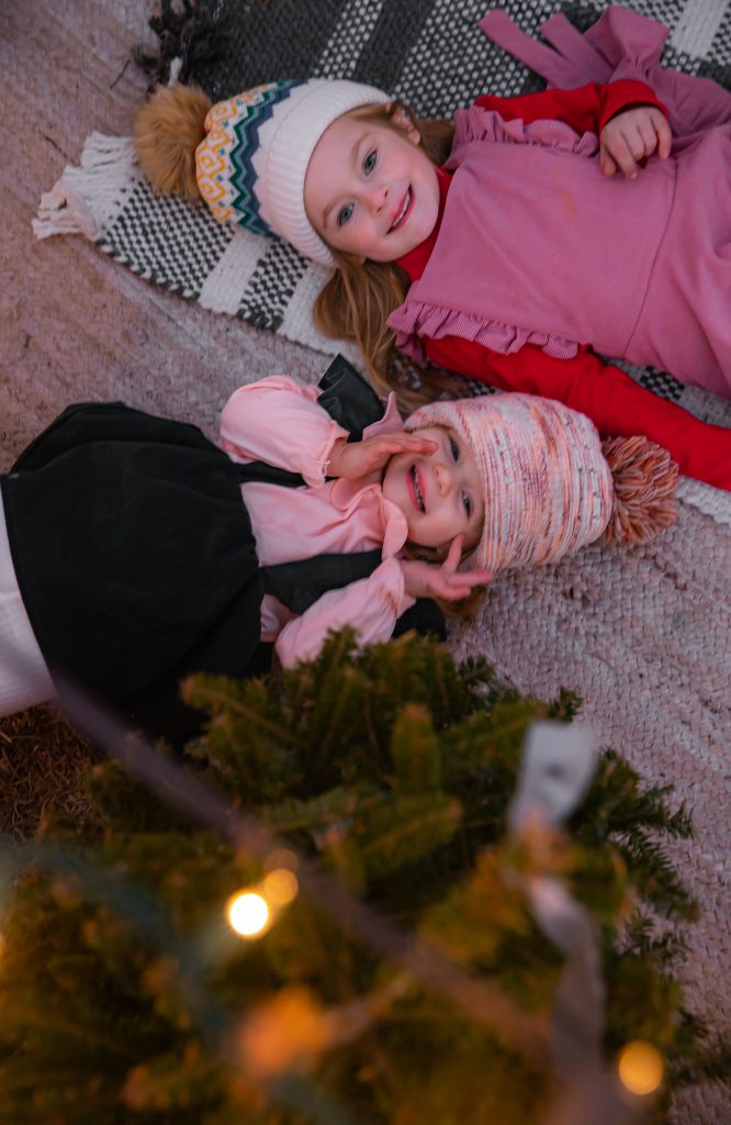 Kids Christmas Tree Farm Photoshoot - Nicki Odom's daughter's looking at the stars