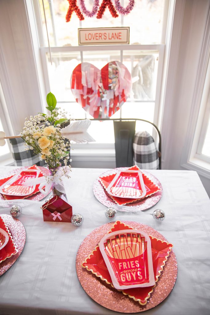 Golden Glam Galentine's day party table setup and decorations