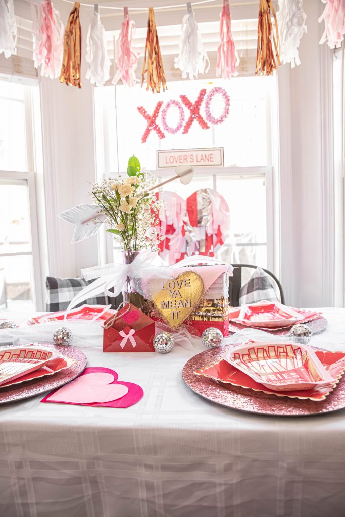 Golden Glam Galentine's day party table setup and decorations