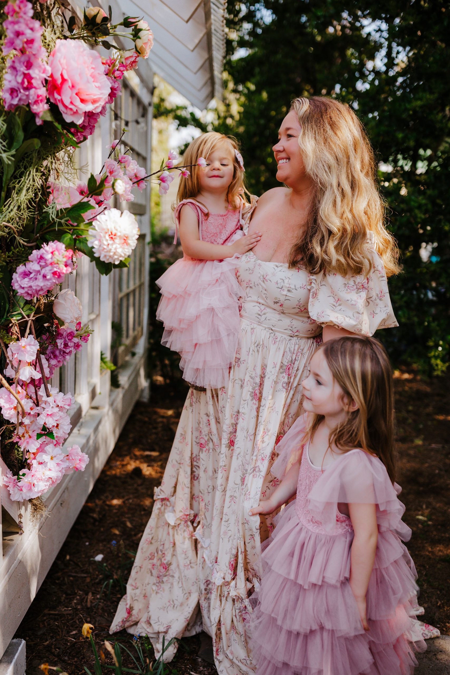 Nicki Odom with daughters in pink maxi dresses for portrait photography