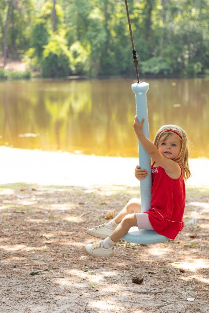 Nicki Odom's daughter on zip line at Kid Friendly place in Fayetteville NC Gillis Hill Farm