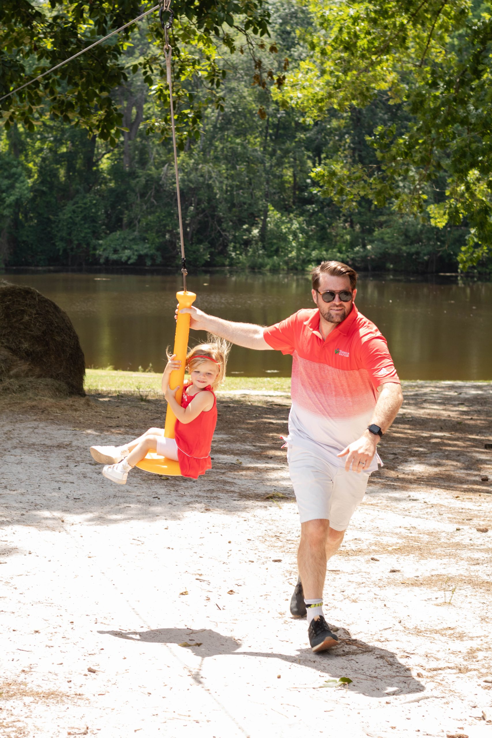 Nicki Odom and family on zip line at Kid Friendly place in Fayetteville NC Gillis Hill Farm