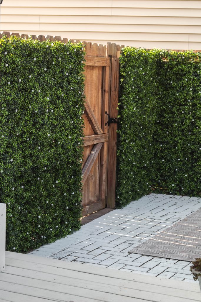 Nicki Odom's back patio transformation with boxwood Greenery by Designer Plants