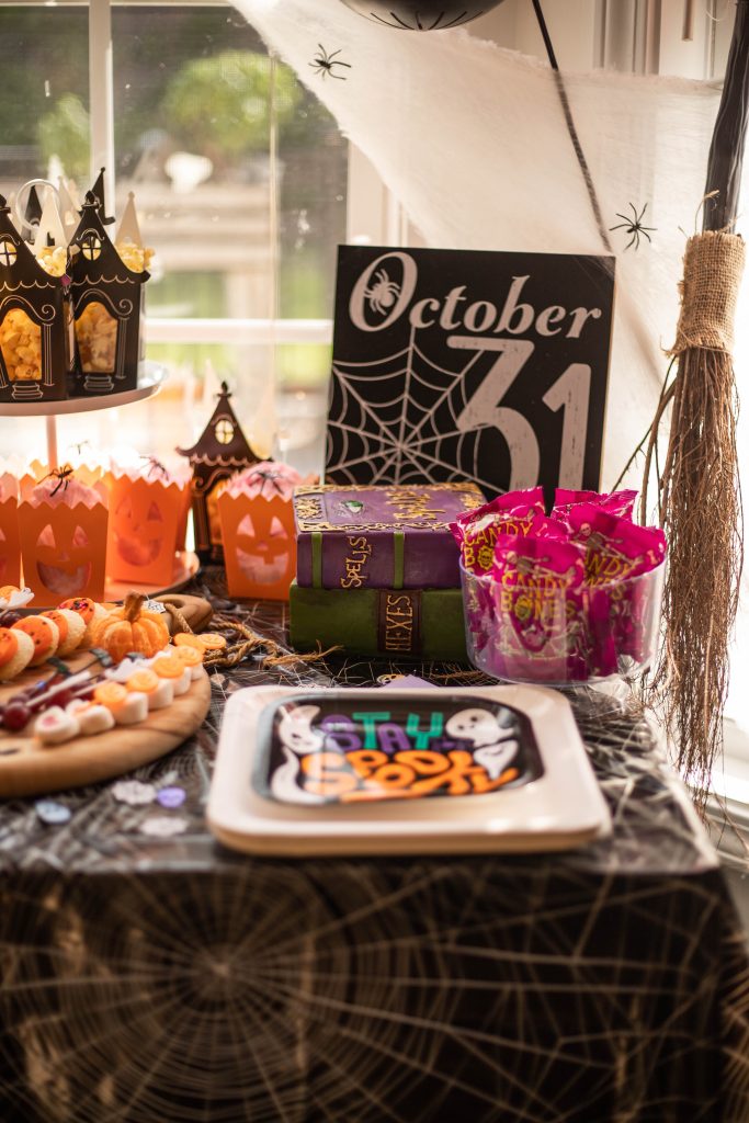Kids snack table at Halloween Party with Stay spooky party plates