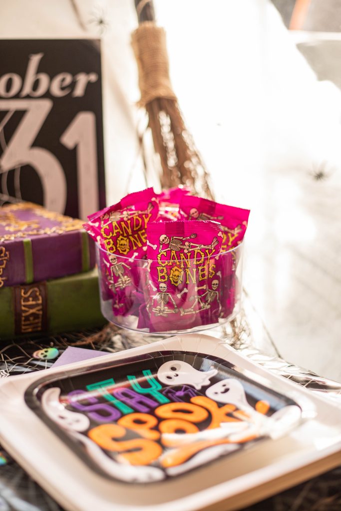 Skeleton bones candy on kids snack table at Halloween Party