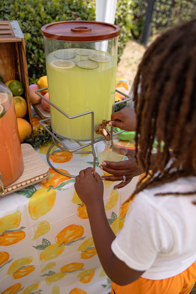 little boy getting lemonade